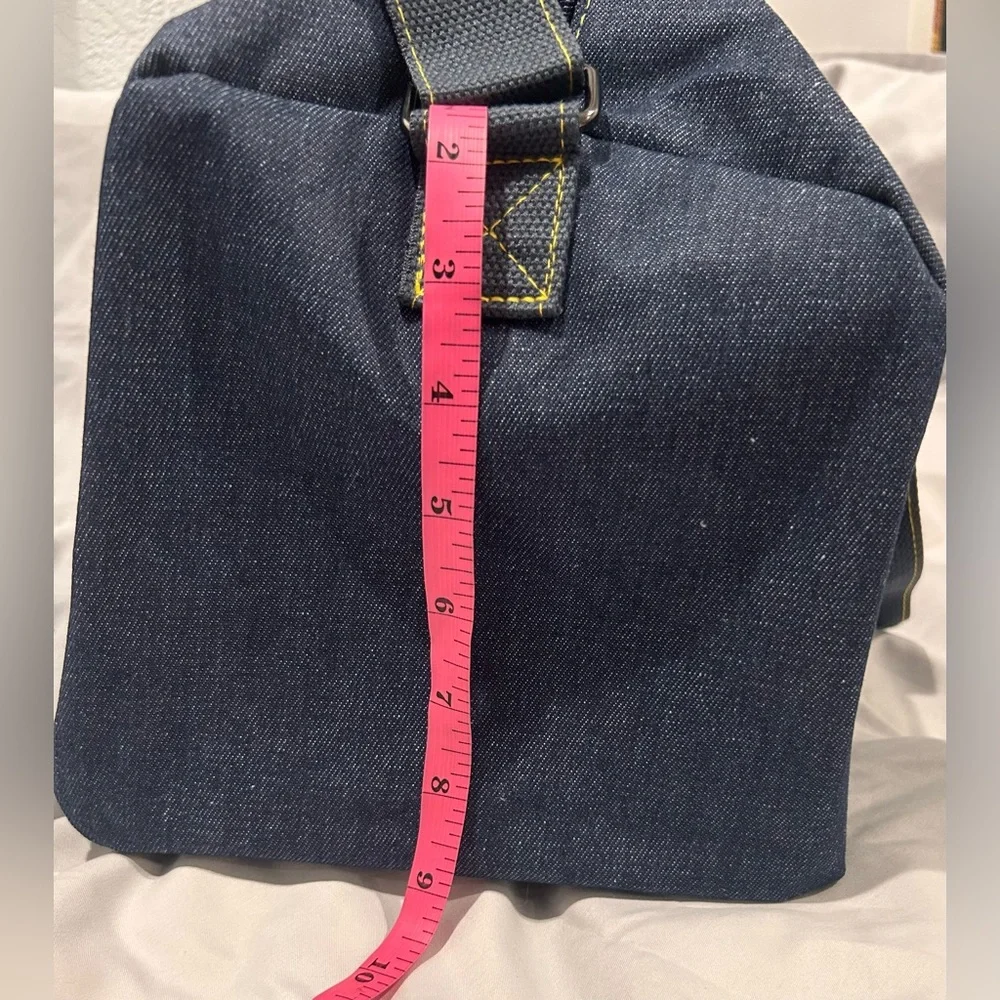Jean Paul Gaultier pour Vous denim weekend duffel bag with adjustable strap